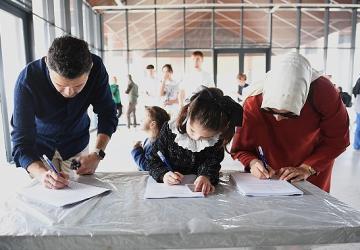 Tarihi koşuya katılacak sporseverler numaralarını aldı