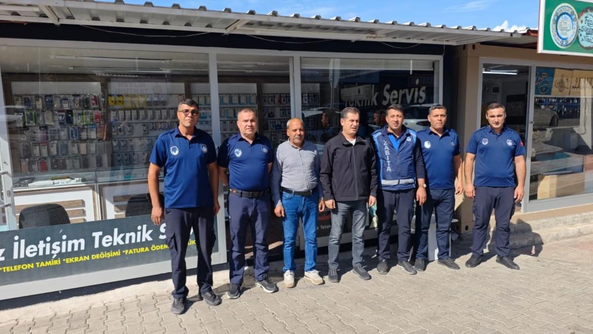 Kahta Belediyesi Zabıta Müdürlüğü yetkilileri, gazeteci Mustafa Kamış ile bir araya geldi