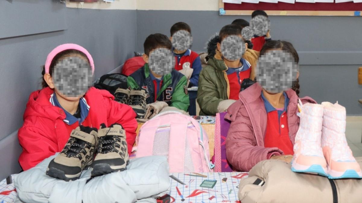 GTÜ öğrencilerinden Kahta’da 400 öğrenciye mont ve bot desteği