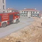 ADIYAMAN (PHA) - Mustafa TEKİN - Adıyaman’ın İndere bölgesinde, kalıcı deprem konutlarının inşaat alanına yakın bir noktada çıkan yangın paniğe neden oldu.